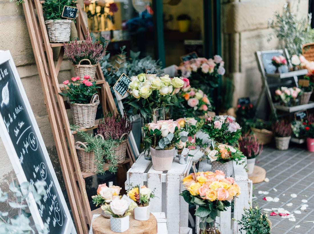 The Petal & Press flower stall, baskets of seasonal blooms